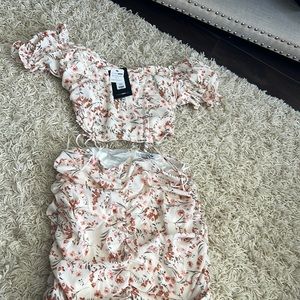 Off the shoulder floral skirt and top set. Never worn. Size medium